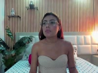 I am a subtle mixture between sweetness and desire. My voice has the softness of a whisper that wraps you, and my laugh, that naughty touch that awakens curiosity. I like to cause delicacy, with looks that say more than they call, and gestures that suggest without hurry.